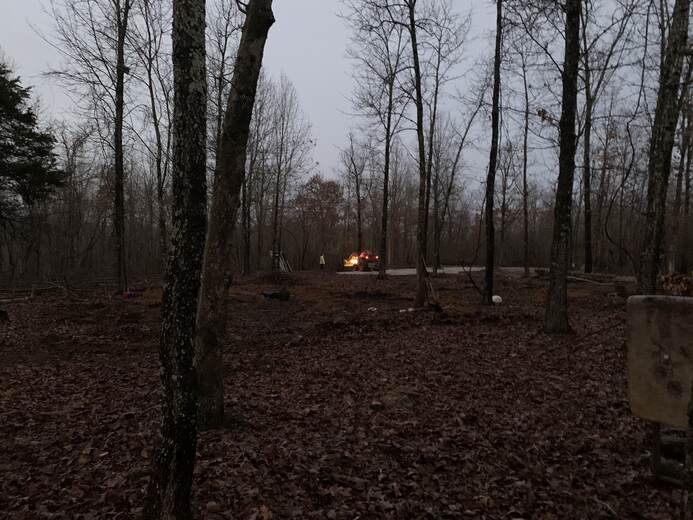 The concrete foundation pad poured by hand during the Ozark homestead build in Ava Missouri — Legacy Farm